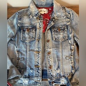 White crow bandana back distressed denim jacket. Purchased at the Buckle.